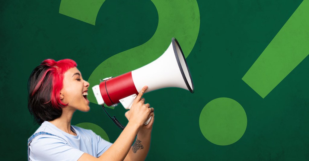 Person shouting into a loud speaking, taking action on Earth Day.